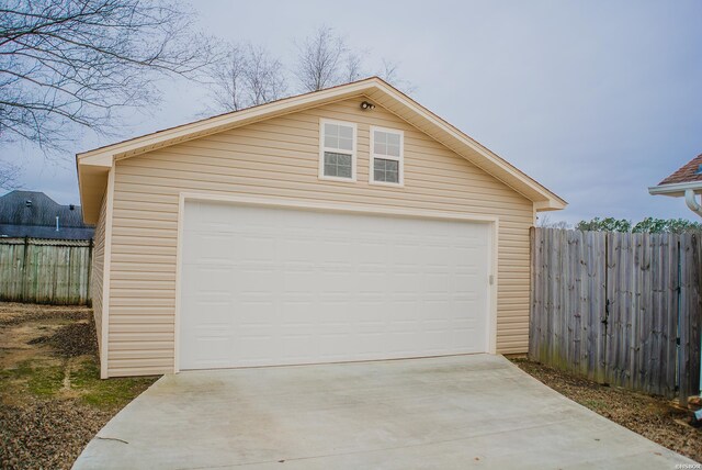 detached garage with fence