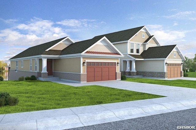 craftsman-style home with driveway, a front lawn, board and batten siding, and an attached garage