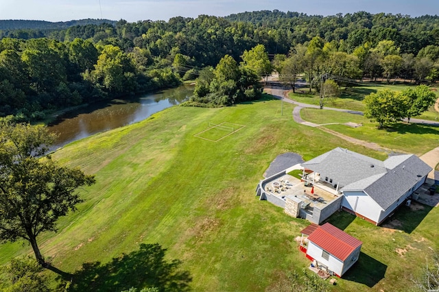 bird's eye view featuring a water view and a wooded view