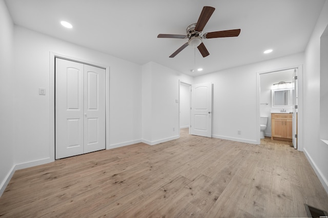 101 Southern Hills Dr, Hot Springs, AR 71913 - unfurnished bedroom featuring light wood-type flooring, recessed lighting, baseboards, a closet, and connected bathroom