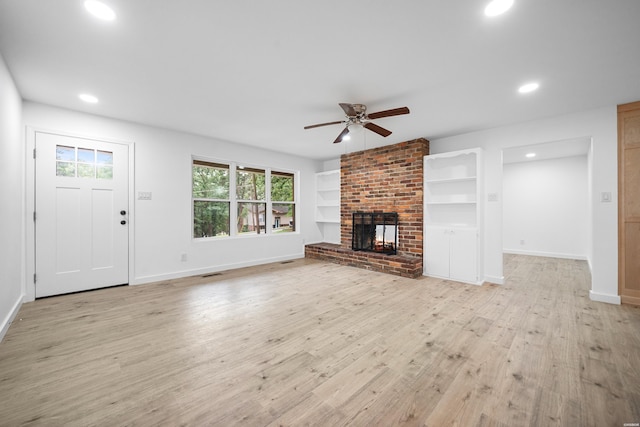 101 Southern Hills Dr, Hot Springs, AR 71913 - unfurnished living room featuring ceiling fan, recessed lighting, light wood-style flooring, baseboards, and a brick fireplace