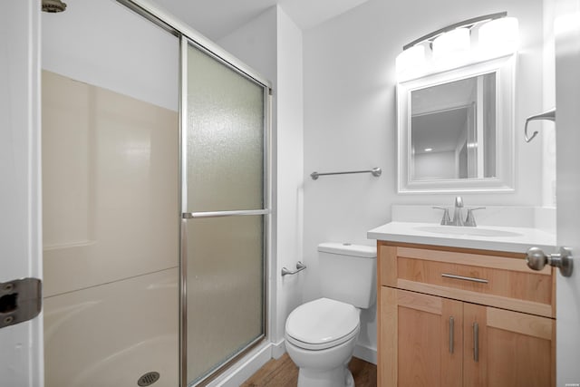 101 Southern Hills Dr, Hot Springs, AR 71913 - full bath featuring a shower stall, vanity, toilet, and wood finished floors