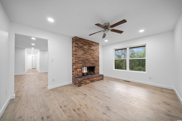 101 Southern Hills Dr, Hot Springs, AR 71913 - unfurnished living room with ceiling fan, wood finished floors, recessed lighting, baseboards, and a fireplace