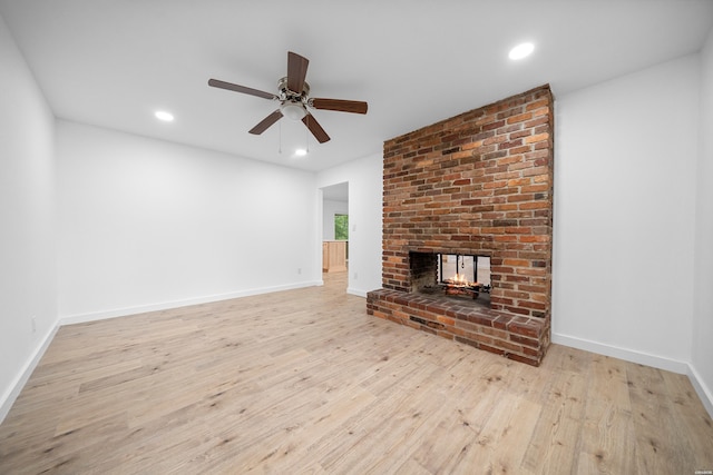 101 Southern Hills Dr, Hot Springs, AR 71913 - unfurnished living room featuring wood finished floors, a ceiling fan, a fireplace, recessed lighting, and baseboards