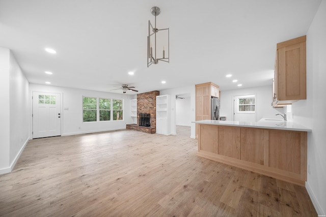 101 Southern Hills Dr, Hot Springs, AR 71913 - unfurnished living room featuring ceiling fan, light wood-type flooring, recessed lighting, a sink, and baseboards