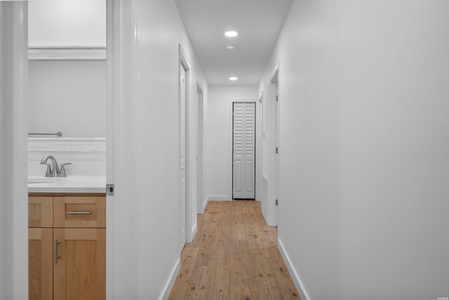 101 Southern Hills Dr, Hot Springs, AR 71913 - hall with light wood-style flooring, a sink, recessed lighting, and baseboards