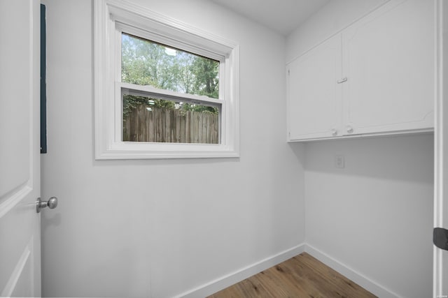 101 Southern Hills Dr, Hot Springs, AR 71913 - washroom with cabinet space, baseboards, and wood finished floors