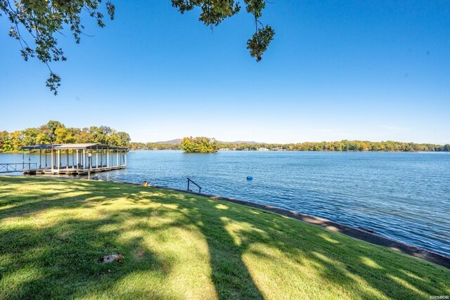 119 Windy Pt Unit 121Windy, Point, Hot Springs, AR 71913 - exterior space featuring a water view and a lawn