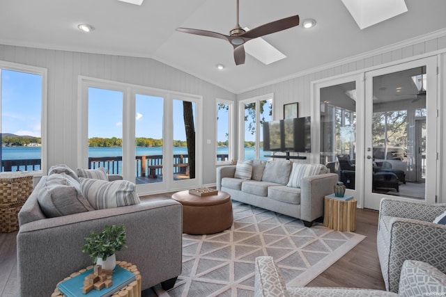 119 Windy Pt Unit 121Windy, Point, Hot Springs, AR 71913 - sunroom / solarium with ceiling fan, vaulted ceiling with skylight, a water view, and a healthy amount of sunlight