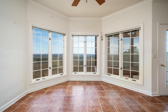 unfurnished sunroom with ceiling fan and visible vents