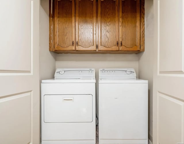 208 Daffodil St Unit D-1, Hot Springs, AR 71913 - laundry area with cabinet space and washer and dryer