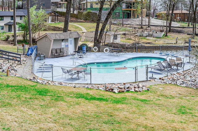 208 Daffodil St Unit D-1, Hot Springs, AR 71913 - pool with an outbuilding, a patio, a lawn, and fence