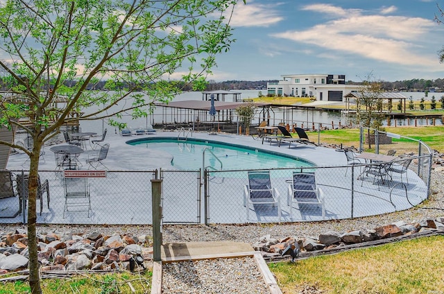 208 Daffodil St Unit D-1, Hot Springs, AR 71913 - pool featuring a water view, a patio area, and fence