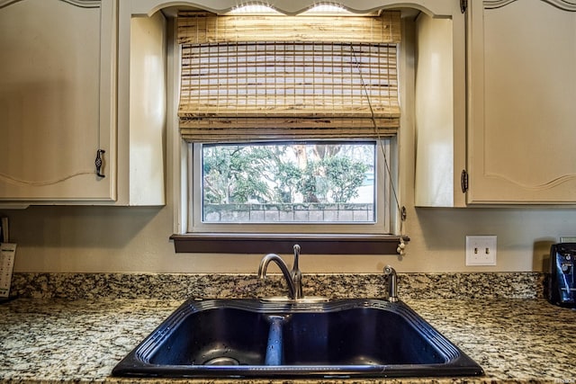 208 Daffodil St Unit D-1, Hot Springs, AR 71913 - kitchen featuring stone countertops and a sink