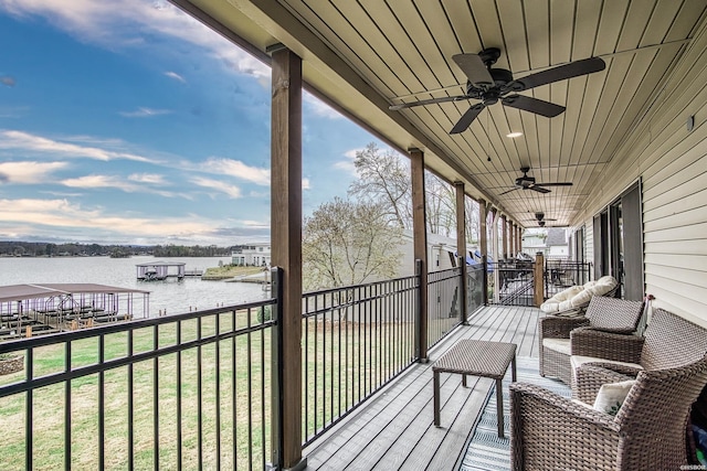 208 Daffodil St Unit D-1, Hot Springs, AR 71913 - wooden terrace with a water view, ceiling fan, and a lawn