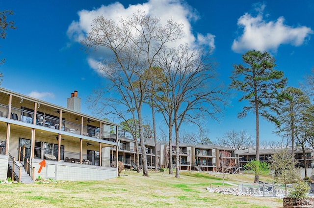 208 Daffodil St Unit D-1, Hot Springs, AR 71913 - surrounding community with stairway and a lawn