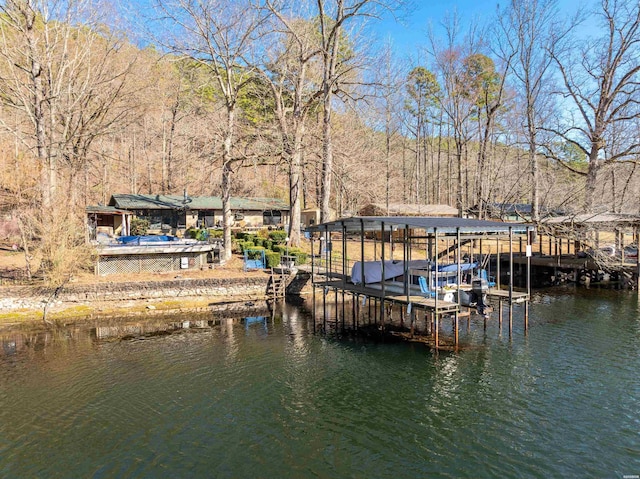 view of dock featuring a water view and boat lift