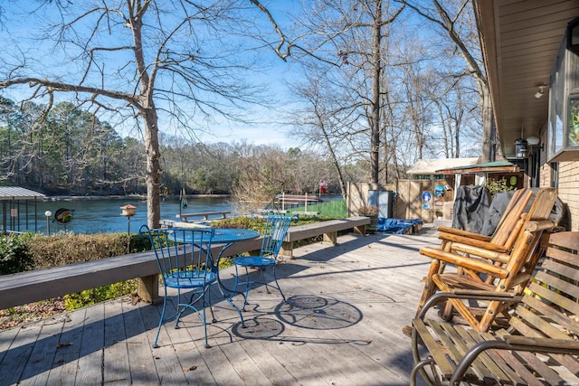 deck featuring a water view