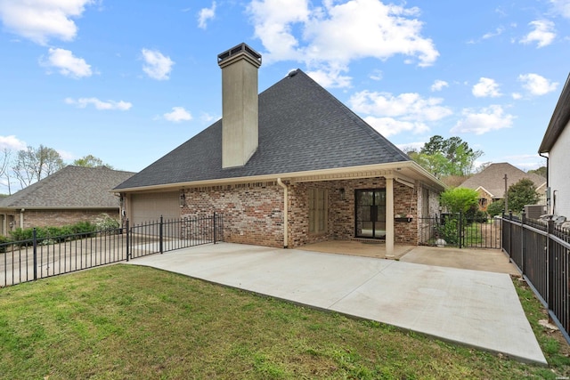 121 Gardens Gate Dr, Hot Springs, AR 71913 - rear view of house featuring a garage, a chimney, a yard, brick siding, and fence private yard
