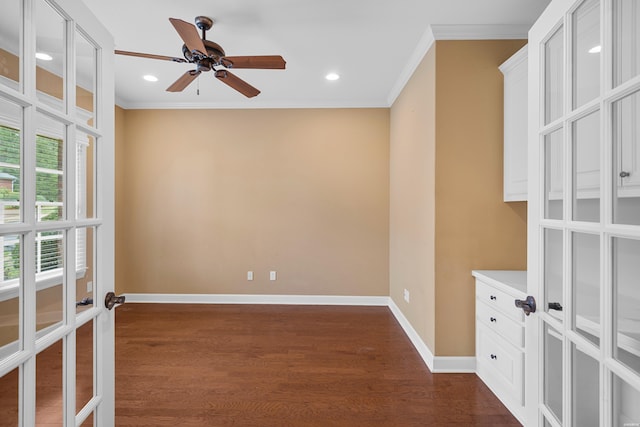 121 Gardens Gate Dr, Hot Springs, AR 71913 - empty room with crown molding, baseboards, dark wood-style flooring, and a ceiling fan