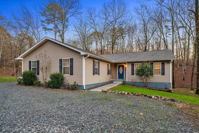 ranch-style home with driveway and crawl space