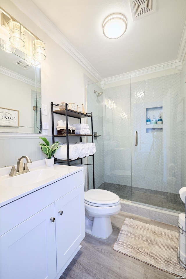 210 Aberina St Unit C-5, Hot Springs, AR 71913 - full bathroom with ornamental molding, vanity, a shower stall, wood finished floors, and wainscoting