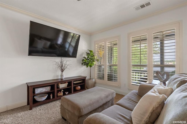 carpeted living room with crown molding, baseboards, and visible vents