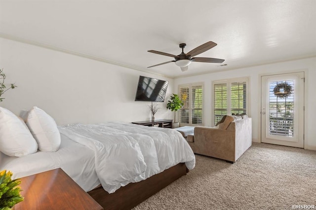 bedroom with carpet floors, ceiling fan, visible vents, and access to exterior