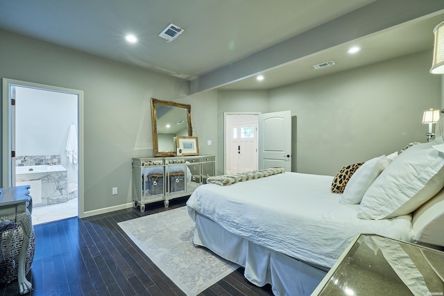 bedroom featuring dark wood-style floors, visible vents, and recessed lighting