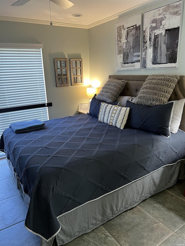 bedroom with crown molding