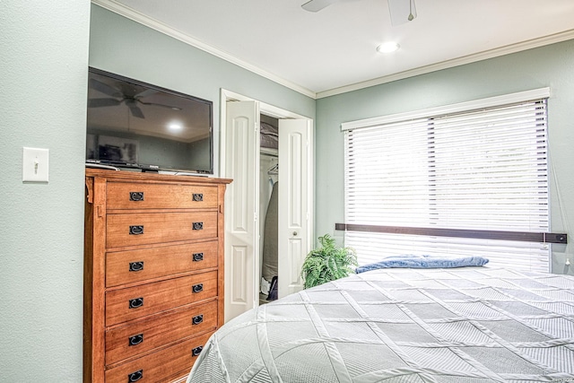 bedroom featuring ornamental molding and a ceiling fan