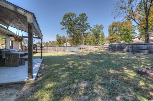 view of yard with a fenced backyard