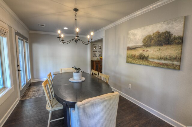 dining space with baseboards, crown molding, visible vents, and dark wood-style flooring