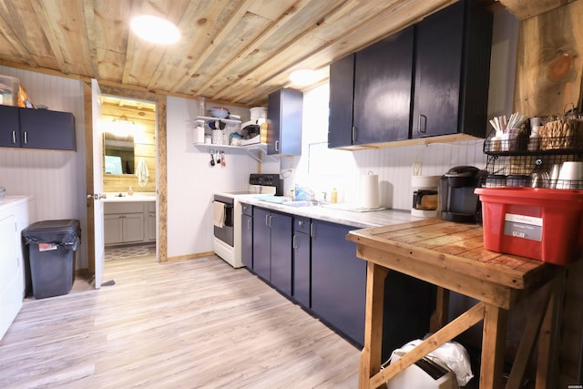 kitchen featuring electric stove, wood ceiling, light countertops, light wood-style floors, and a sink