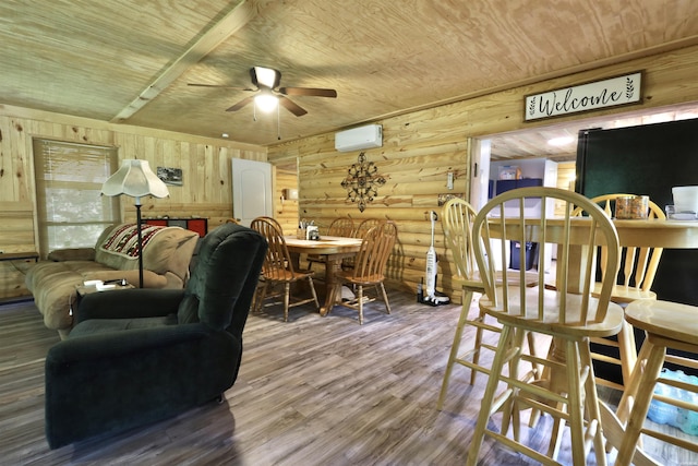 living room featuring a wall unit AC, log walls, a ceiling fan, wood finished floors, and wooden ceiling