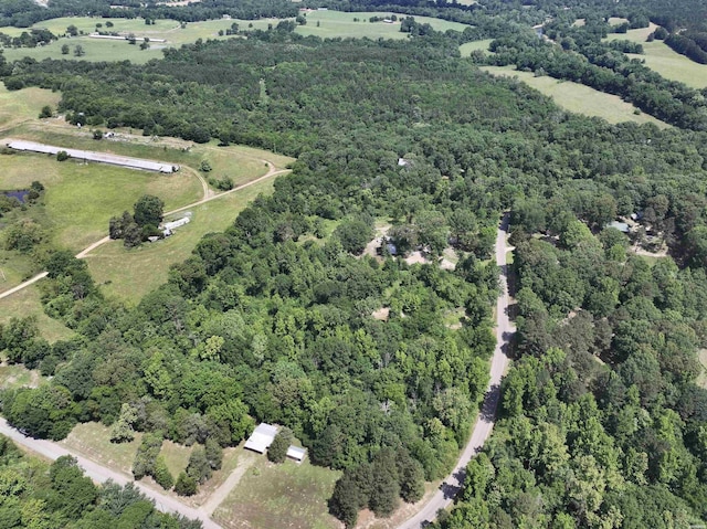 aerial view featuring a forest view