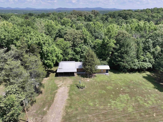 aerial view with a forest view and a mountain view