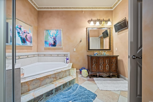 full bathroom featuring a garden tub, vanity, baseboards, and tile patterned floors