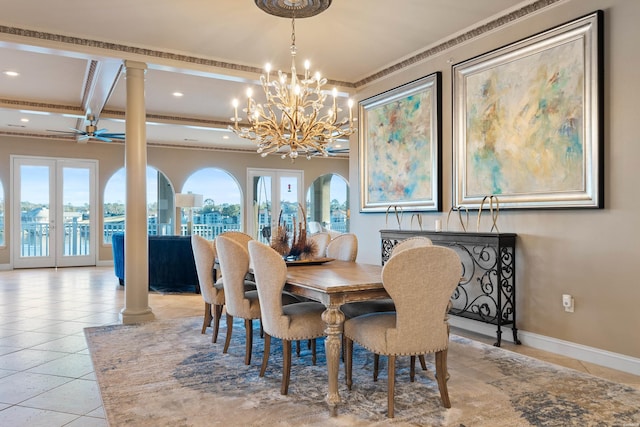 dining area with light tile patterned floors, french doors, decorative columns, and a healthy amount of sunlight