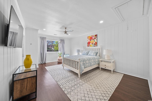 bedroom featuring a ceiling fan, recessed lighting, baseboards, attic access, and dark wood-style flooring