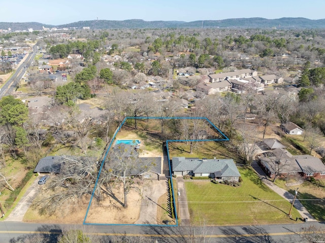 drone / aerial view with a residential view and a mountain view