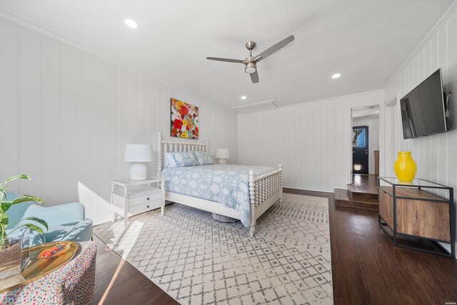 bedroom featuring ceiling fan, attic access, wood finished floors, and recessed lighting