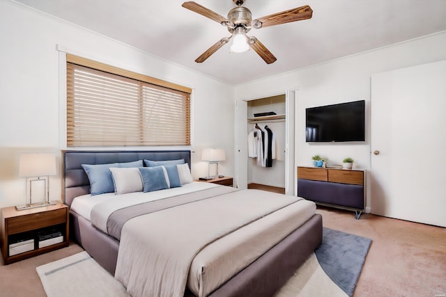 bedroom with light carpet, ceiling fan, and a closet