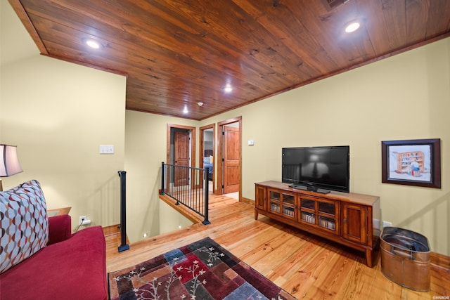 living room with recessed lighting, wood finished floors, wood ceiling, baseboards, and ornamental molding