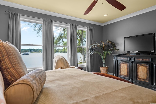 bedroom with a water view, ornamental molding, a ceiling fan, and recessed lighting