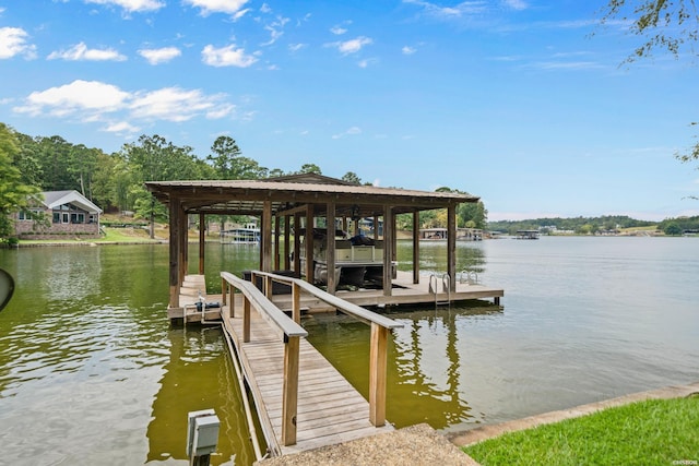 view of dock with a water view and boat lift