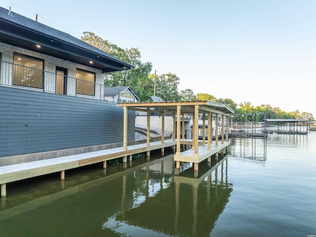 dock area featuring a water view