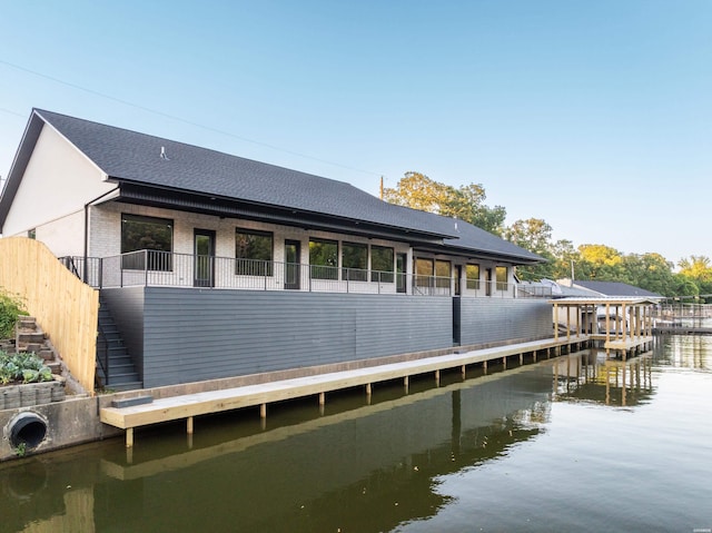 dock area with a water view