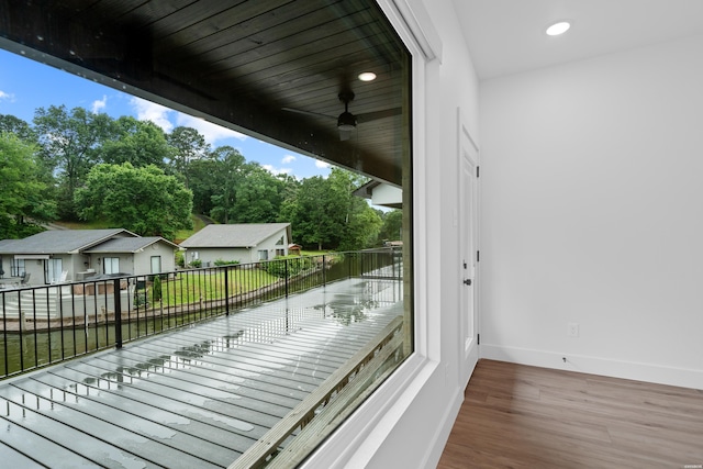 exterior space featuring ceiling fan