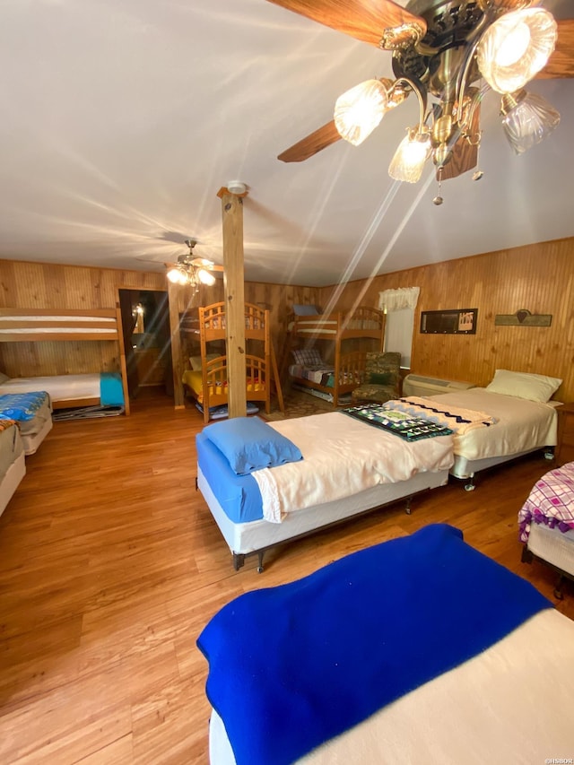 46 Hickory Hill Ln, Mount Ida, AR 71957 - bedroom featuring wood finished floors and wooden walls